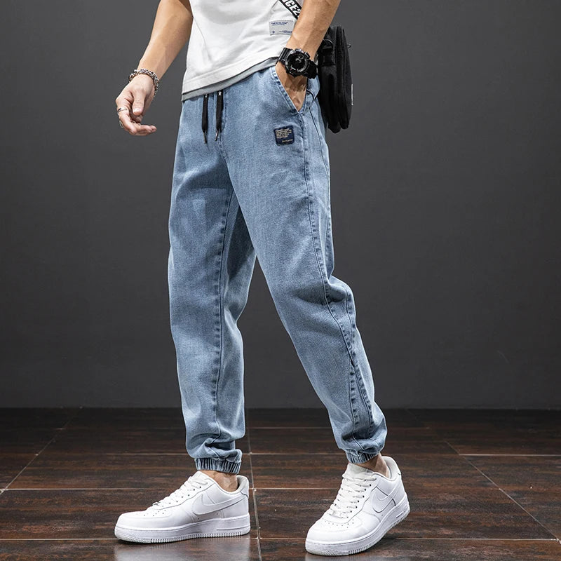 Printemps Été Noir Bleu Cargo Jeans Hommes Streetwear Denim Jogger Pantalon Hommes Baggy Harem Jean Pantalon grande taille 6XL 7XL 8XL