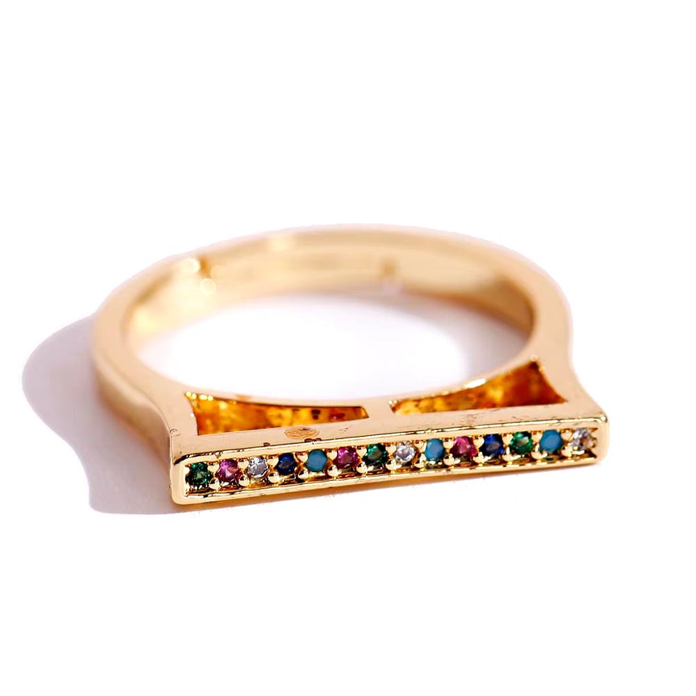 Gold color stackable punk rock snake ring for women with clear CZ stones.